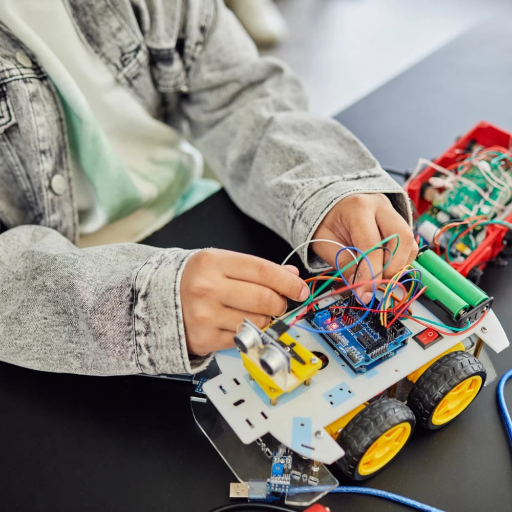 Nexus pathway, a child building a robotics project