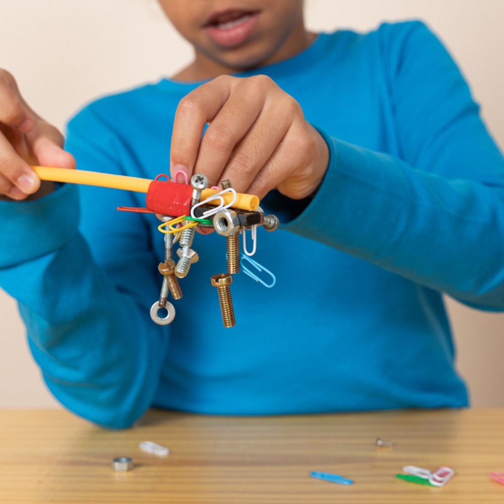 Nova pathway, a child tinkering and building